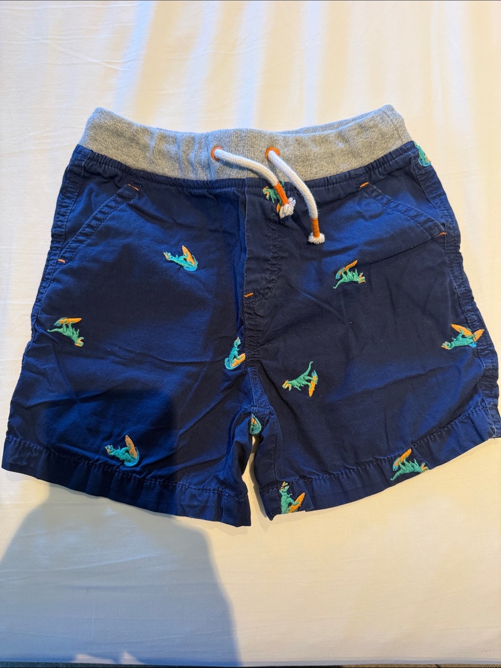 Navy Blue Boys Shorts with Surfing Dinosaur Embroidery